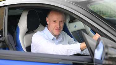 Phil McNamara sitting in Vanquish
