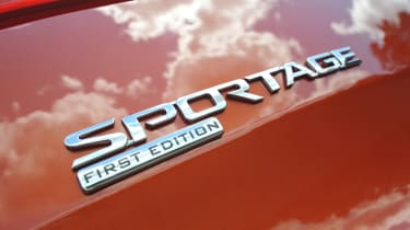 Kia Sportage First Edition badge