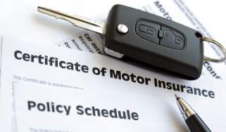 Car insurance documents and car key