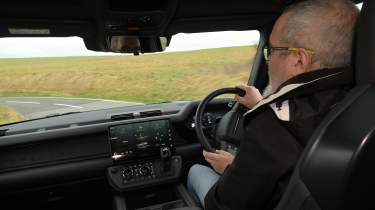 Auto Express senior test editor Dean Gibson driving the Land Rover Defender OCTA Black