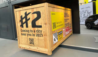 New Smart #2 teaser from Munich Motor Show 2025 - front, in a wooden crate