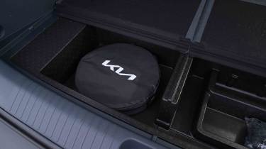 Kia PV5 - underfloor storage charging cable