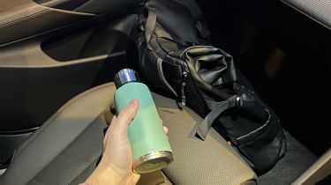 BMW 530e Touring long-term - seat with bag and water bottle