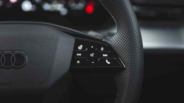 Audi Q5 - audio, heated steering wheel, star shortcut, and phone controls