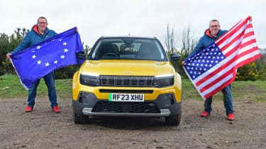 Auto Express editor-at-large John McIlroy holding an EU and US flag while standing next to the Jeep Avenger