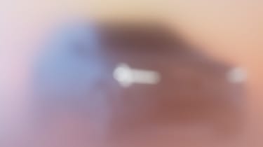 Volvo EX90 blurred teaser image - front