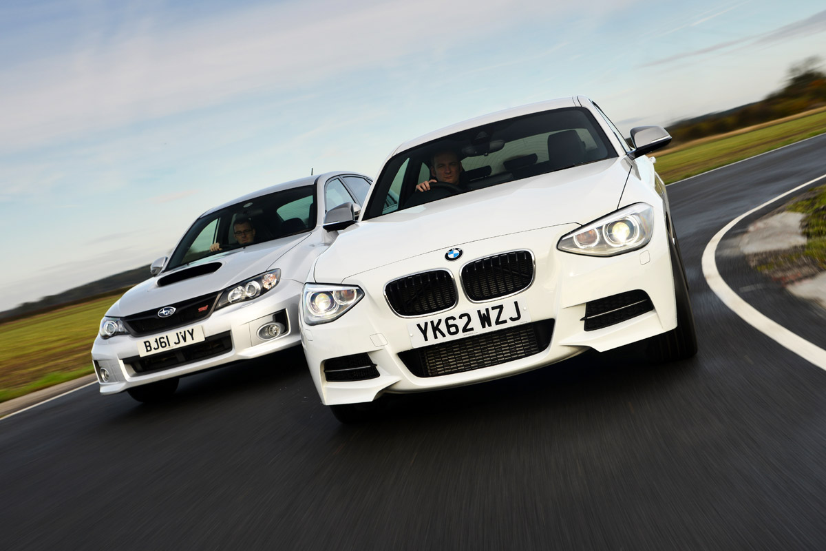 BMW M135i vs Subaru WRX STi 320R  Auto Express