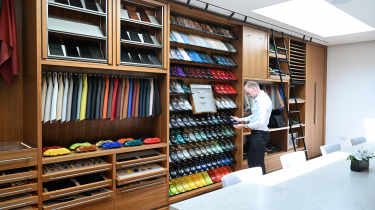 Phil McNamara inspecting paint sample