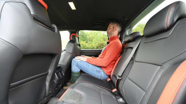Auto Express deputy editor Richard Ingram sitting in the back seat of the Ford Ranger Raptor