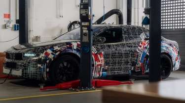 BMW electric M3 prototype - front on a ramp