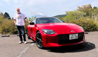 Auto Express editor-at-large Phil McNamara standing next to a Nissan Z