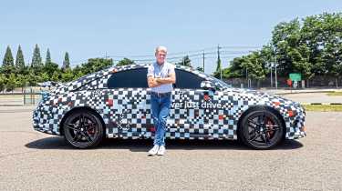 Tomas Hirschberger standing beside the Hyundai Ioniq 6 N prototype