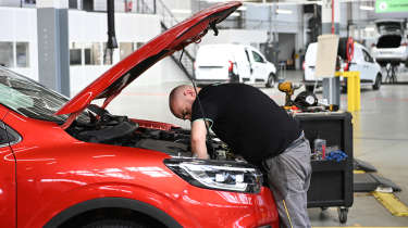 Renault ReFactory - technician working in engine bay