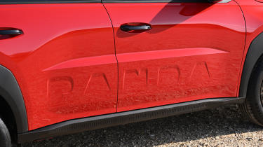Fiat Grande Panda hybrid - side Panda logo