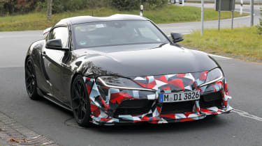 Toyota Supra GRMN (camouflaged) – front 3/4 action