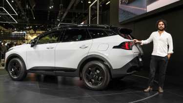 New 2025 Kia Sportage facelift LA Motor Show - rear 3/4 with Jordan Katsianis 