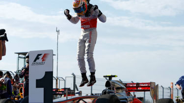 Lewis Hamilton celebrates his victory at the US Grand Prix