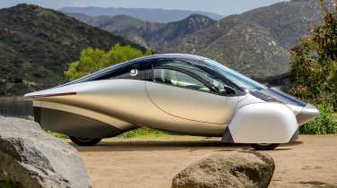 Aptera Solar Car - side profile by lake