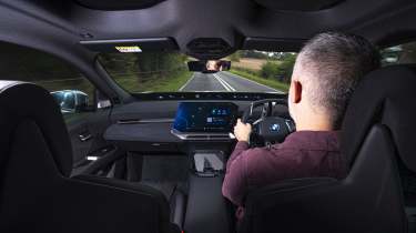 New BMW iX3 40 M Sport - front interior, car being driven by Auto Express deputy editor Richard Ingram