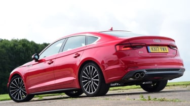 Red Audi A5 Sportback - side tracking.
