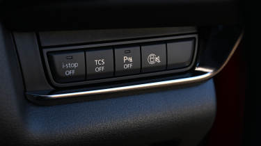 Mazda CX30 - driver-assistance buttons