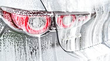 Mazda 3 tail light covered in snow foam