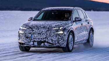 Audi Q6 e-tron official teaser image: front tracking in snow