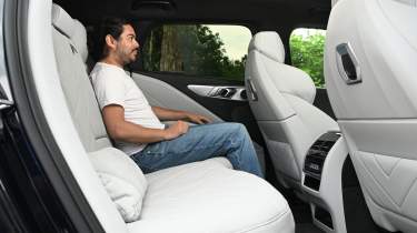 Jordan Katsianis sat in the BMW XM Label