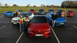 Auto Express team members standing with a selection of cars