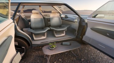 Kia Concept EV5 - passenger seat table arrangement