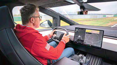 Auto Express contributor Robin Hornig driving the Tesla Cybertruck Cyberbeast