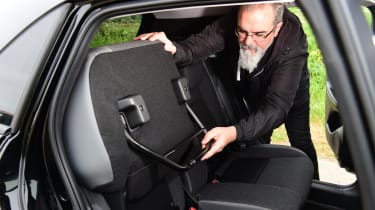 Auto Express senior test editor Dean Gibson adjusting the Honda Jazz&#039;s &quot;Magic Seats&#039;