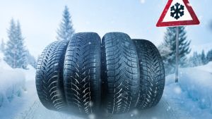 Winter tyres with snow warning sign