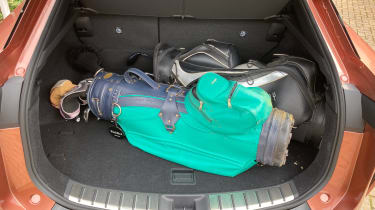 Lexus RZ – boot with golf bag