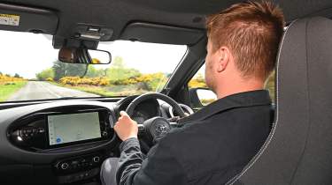 Alastair Crooks driving the Toyota Aygo X JBL