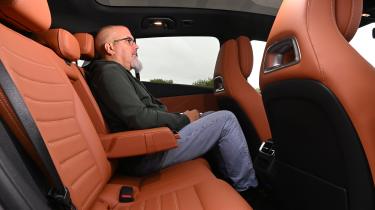 Mercedes GLC 2026 - rear seats sat in by Auto Express senior test editor Dean Gibson