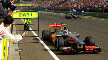 Lewis Hamilton crosses the finishing line