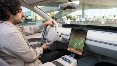 Jordan Katsianis driving the Skoda Vision O concept