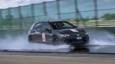 Auto Express Summer Tyre Test 2025 - Volkswagen Golf GTI undergoing wet weather aquaplaning 