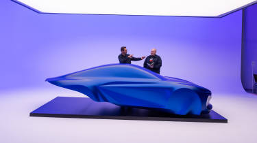 Alpine A110 EV sculpture - Auto Express news reporter Ellis Hyde speaking to Antony Villain, designer, side profile
