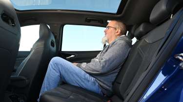 Volkswagen ID.4 Pro Black Edition 4MOTION - rear interior, seats being sat in by Auto Express senior test editor Dean Gibson