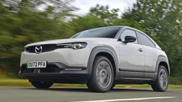 Three-car garage - Mazda MX-30 front tracking 