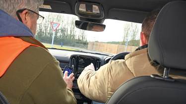 Auto Express senior content editor Shane Wilkinson driving the Volvo EC40