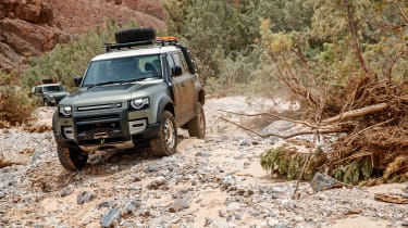 Land Rover Defender off road rocks