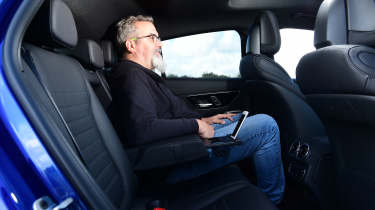 Auto Express senior road test editor Dean Gibson sitting in the Mercedes GLC's rear seat
