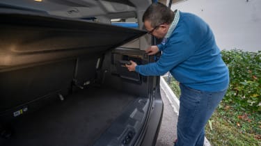 Auto Express editor-at-large John McIlroy inspecting the Ford Tourneo Courier&#039;s boot