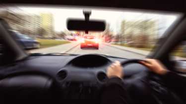 Car braking heavily - interior view