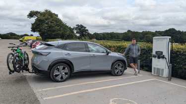 Auto Express head of digital content Steve Walker leaning on the Nissan Ariya