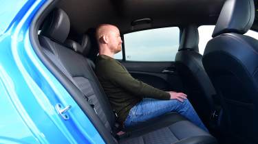 Auto Express chief reviewer Alex Ingram sitting in the MG3&#039;s back seat