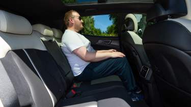 Ellis Hyde sitting in the Kia Sportage